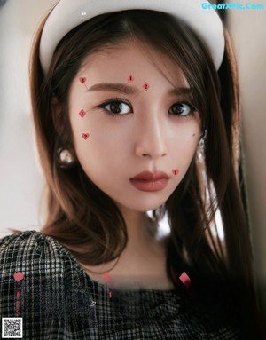 A magazine page with a picture of a woman's face.